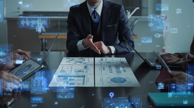 Concept image of a group of business people meeting in an office and digital technology - Powered by Adobe