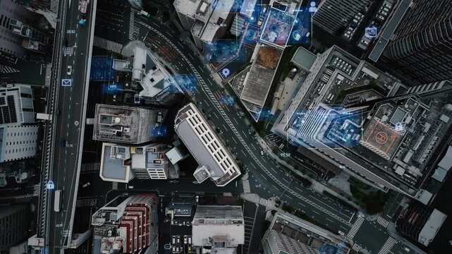 現代都市と道路の真俯瞰ドローン空撮とデジタルテクノロジーのコンセプトイメージ