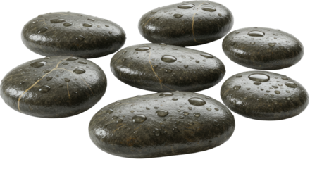Macro view of wet smooth black stones arranged on white background, ideal for spa or wellness themes