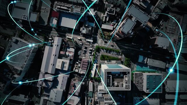 Concept image of a modern city and roads taken by drone with a bird's-eye view and communication network
