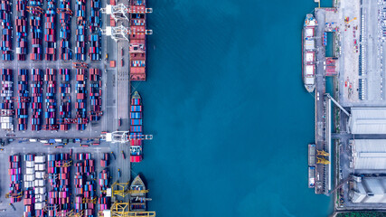 Aerial view of container cargo ship at sea port terminal, Container cargo ship in import export...