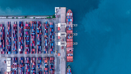 Aerial view of container cargo ship at sea port terminal, Container cargo ship in import export...