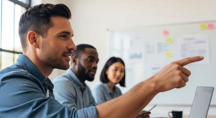 Business team collaborating in modern office setting during project discussion