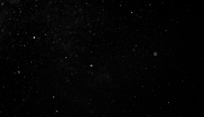 Floating Dust Motes on Black Background