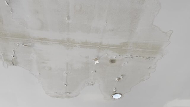 Roof leak cause ceiling stain, ceiling water damage.