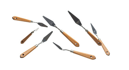 Set of six palette knives with wooden handles isolated on white background, perfect for painting and artistic work