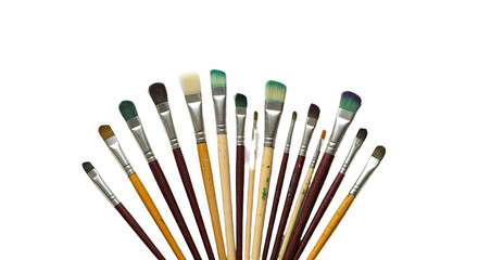 Set of various artist paintbrushes with wooden handles and colored bristles isolated on white background, perfect for painting and art projects