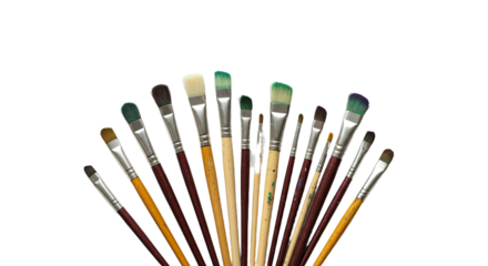 Set of various artist paintbrushes with wooden handles and colored bristles isolated on white background, perfect for painting and art projects