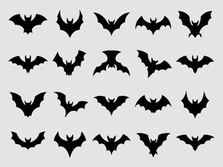 Collection of silhouetted bats in various flying poses