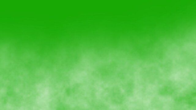 Moving white smoke or fog loop on green screen background