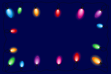 New Year's garland of multi-colored light bulbs on a dark blue background with a place for text