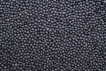 Black lentils background	
