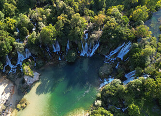 Kravica Waterfalls, located in Bosnia and Herzegovina, is one of the country's most popular tourist attractions. People come here to take photos, camp, picnic, and swim.