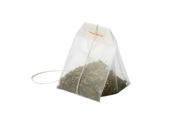 A single-serving tea bag filled with loose leaf tea, isolated on a transparent background. background removed