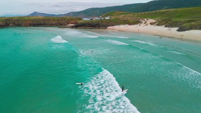 Aerial view of Playa de Santa Comba beach with turquoise sea in Galicia Spain