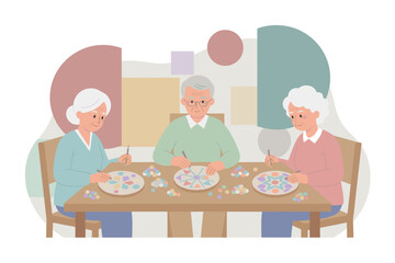 Happy seniors enjoying a creative craft activity together fostering wellbeing and social connection