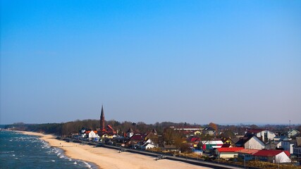 Tranquil Polish Baltic coast, Sarbinowo and smooth sea under sunlight.