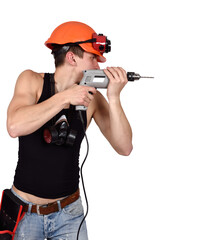 Male builder holds a drill in his hands. Labor force concept