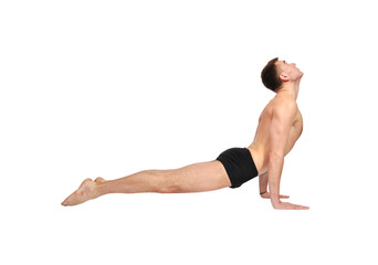 Focused caucasian man practicing yoga.