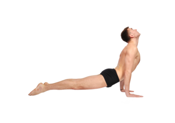 Focused caucasian man practicing yoga.
