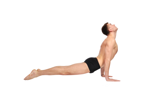 Focused caucasian man practicing yoga.