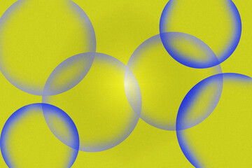Translucent Blue and White Circles Overlapping on Yellow Background spheres bubbles