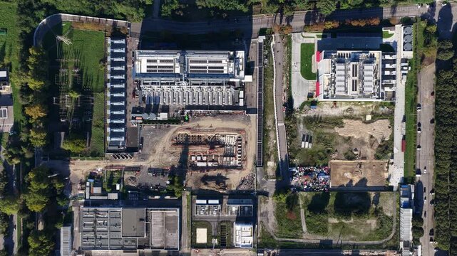 New constructed data center in Milan Italy. Big data, high tech, server space and AI, artificial intelligience in Italy. Aerial video. Hyperscaler. Machine learning and IT technology.