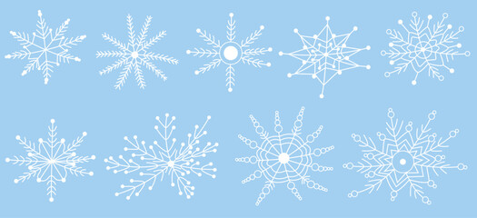 White snowflakes on a blue background in doodle style. Hand-drawn vector snowflake illustration. Festive frosty elements in a minimalist style. Snowflake icons, snow symbol. Snow