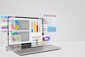 Laptop with a futuristic Business Intelligence(BI) interface, showing multiple virtual screen with data analysis chart,financial graph,company performance KPI for data-driven decision-making.
