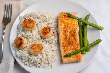 baked salmon with rice and scallops