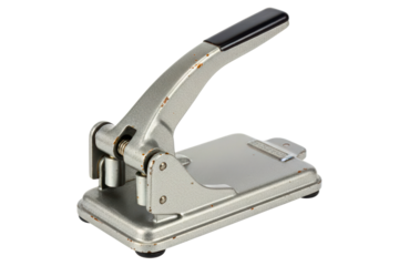 Vintage two-hole puncher made of metal for office documents isolated on a transparent background