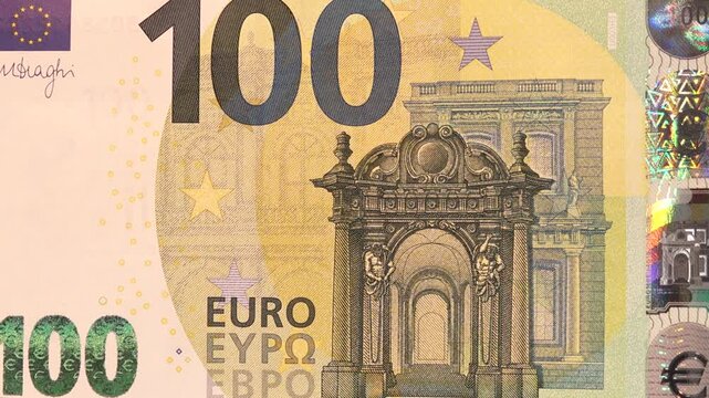 Close Up Of A 100 Euro Banknote Highlighting Architecture And Economic Symbolism
