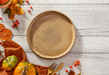 Empty plate and autumn elements