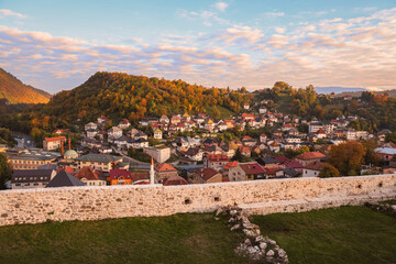 Panoramic view of Travnik, Bosnia and Herzegovina, from the medieval fortress at sunset, showing...