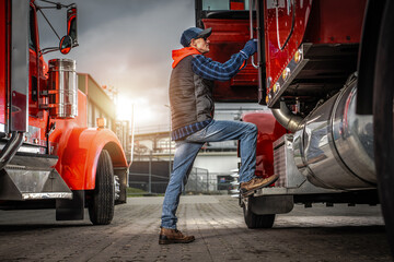 Truck Driver Preparing for a Long Haul at Sunset