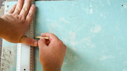 Precise hands measure seafoam board, evoking meticulous craftsmanship, embodying meticulous Russian...