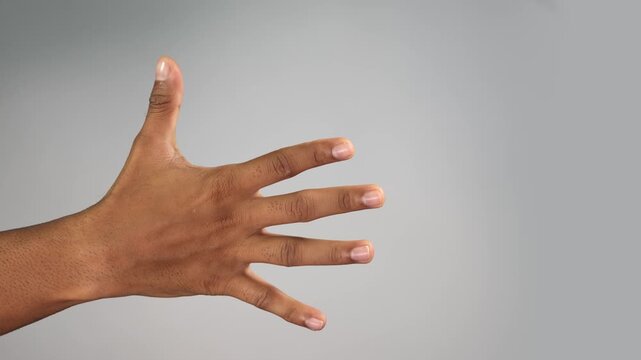 Close-Up Hand Gesture &mdash; Counting One to Five with Hand for Team Building Concept on Studio Background