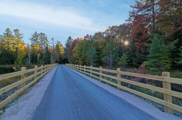 Brilliant fall foliage along the Adirondack Rail Trail near Floodwood in the Adirondacks upstate NY