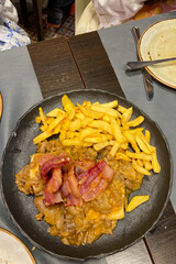 Tasty fresh seafood served in a traditional restaurant in Santander, Spain.