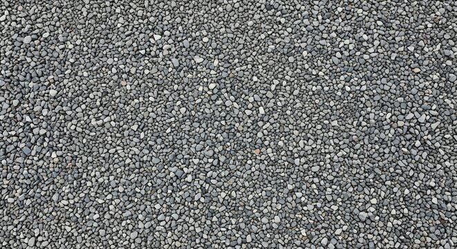 A highangle shot reveals a dense graytoned gravel surface with a mix of small rounded pebbles