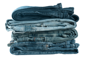 Denim jeans stacked neatly in varied shades of blue