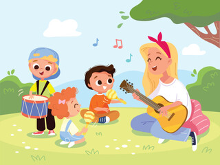Music teacher leads music class for toddlers on park meadow. Mother plays guitar and sings song for her children sitting on the grass. Children and caregivers spend quality time together in nature.