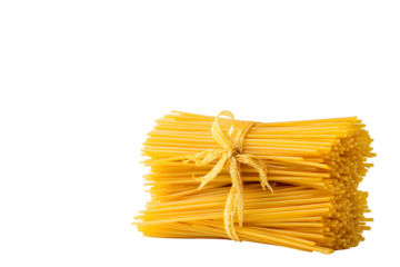 Neatly tied stack of uncooked italian spaghetti on gold background