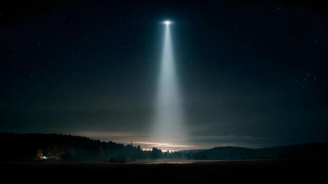 Fototapeta Night sky with a bright beam of light descending from a glowing point onto a foggy field as stars twinkle above a dark forest. Concept Mystical Night Sky, Beam of Light Descent