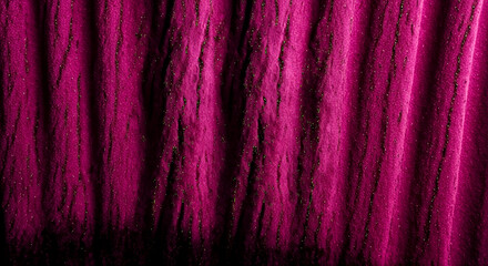 Textured magenta fabric with shimmering accents in a wavy pattern
