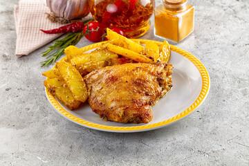 Baked chicken thighs with potatoes