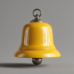 Yellow Bell with Metal Top and Ball on Gray Background