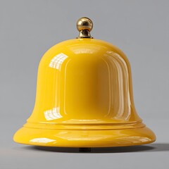 Bright Yellow Bell with Gold Finial on Gray Background