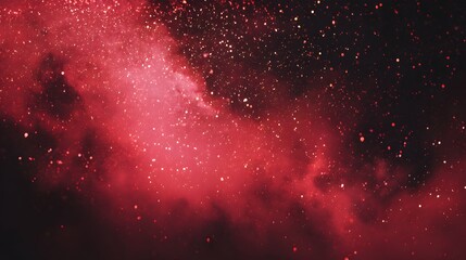 Fototapeta premium Red nebulous cosmic dust with glowing particles illuminates dark space.