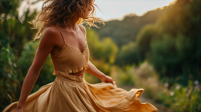 A woman in a yellow dress is running through a field - Powered by Adobe